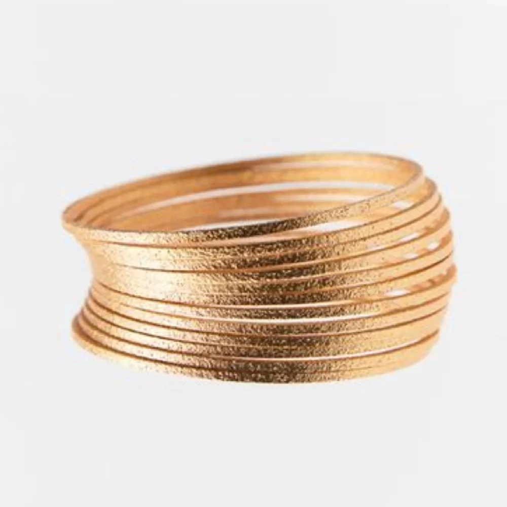 NWT. Zara Golden Pack of Multiple Textured Metal Bracelets.